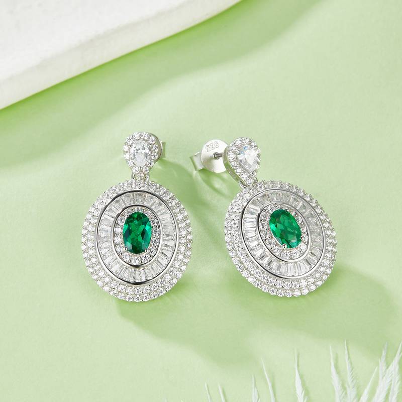 E1128 蛋形培育彩宝S925银镀白金耳环主石6*4mm/1.05CT