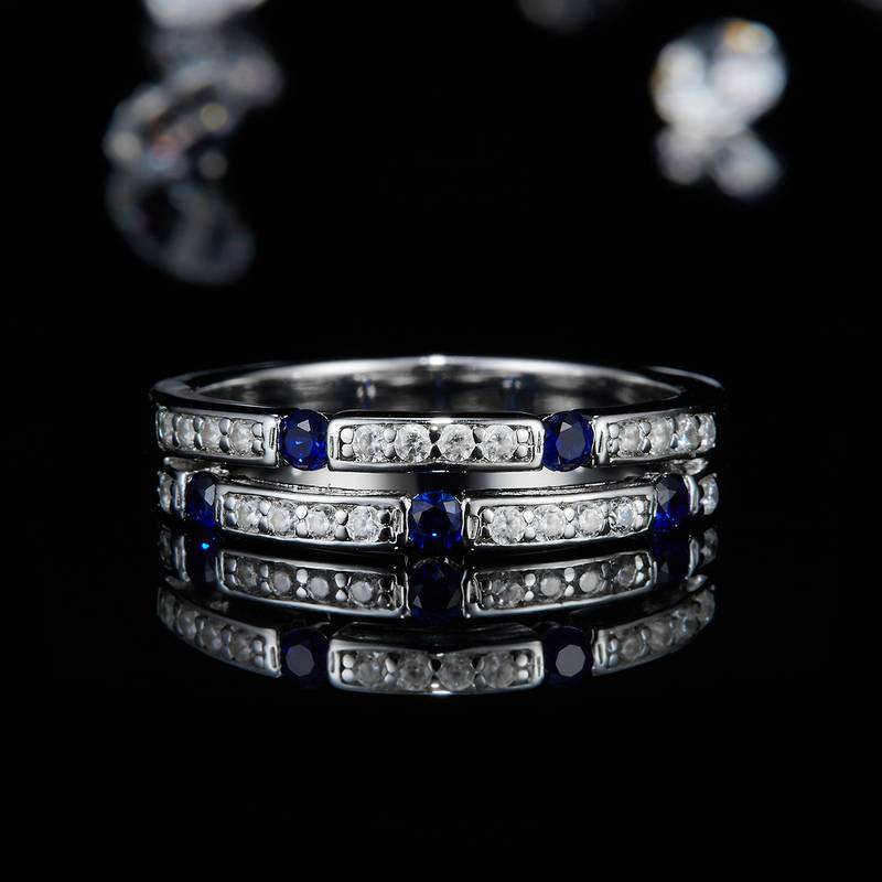 排戒S925银镀白金女戒定制选款副石培育蓝宝伴镶莫桑钻0.45ct