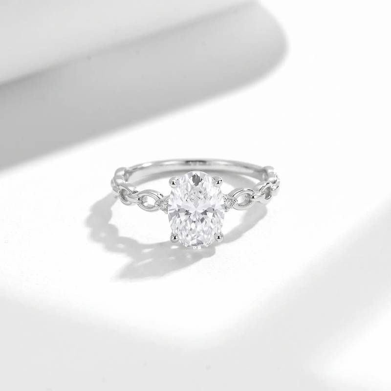 FX39510款S925银镀18K金蛋形莫桑钻环环相扣女戒主石8*6mm/1.5ct