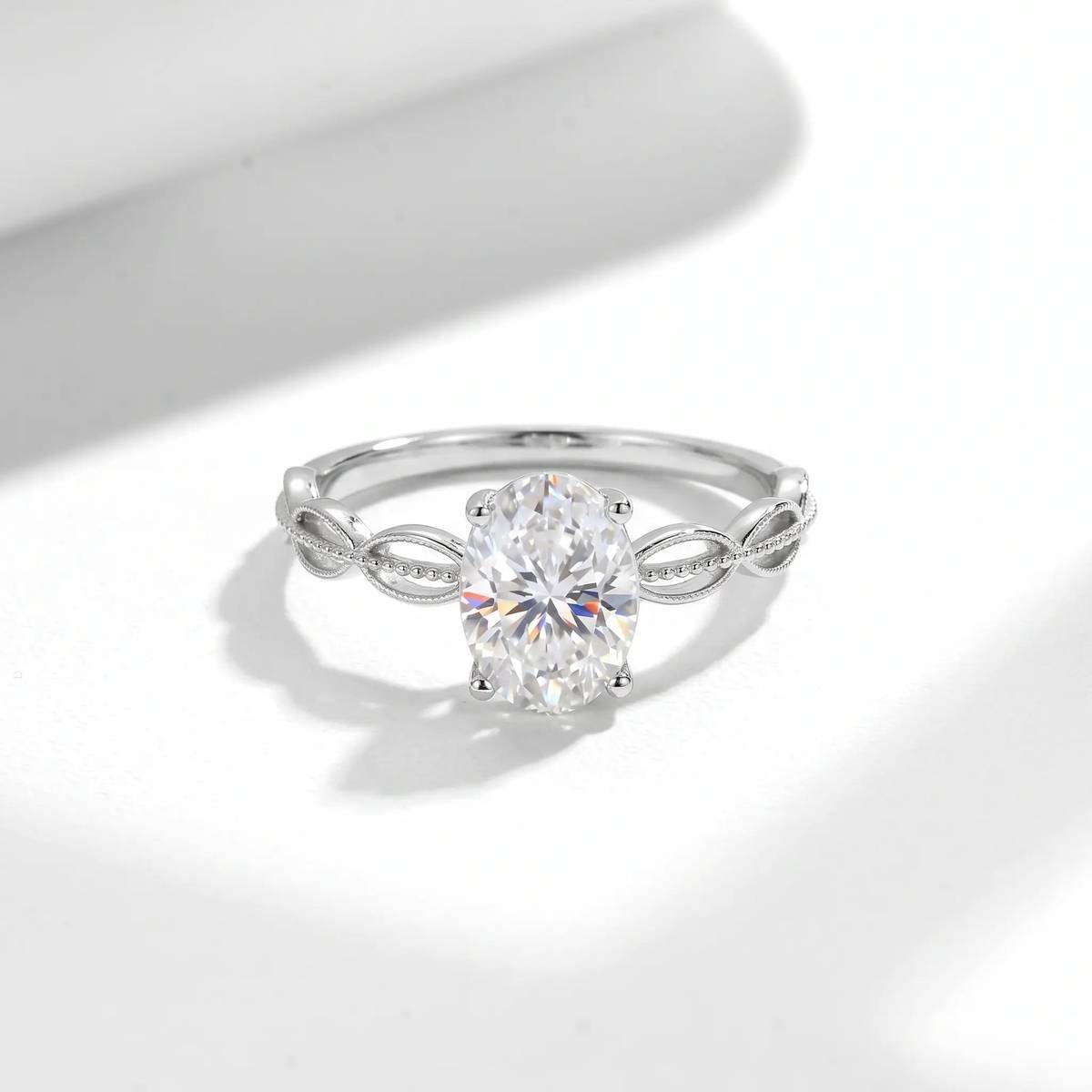 FX39512款S925银镀18K金蛋形莫桑钻镂空扭绳女戒主石8*6mm/1.5ct