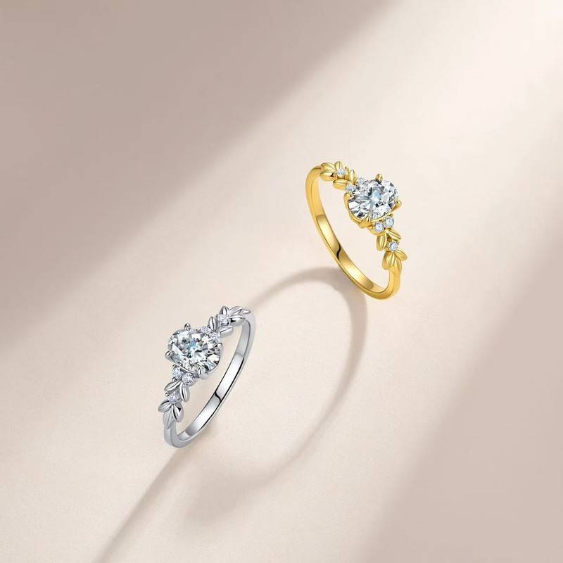 SR0729101款S925银镀18K金蛋形莫桑钻橄榄叶女戒1.1ct