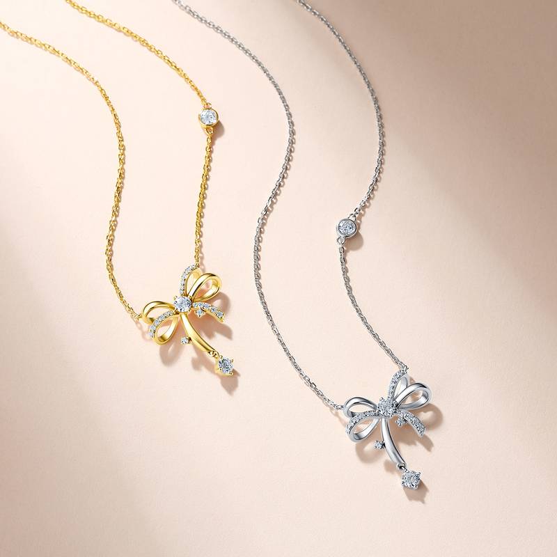 SP0566101款S925银镀18K金莫桑钻闪烁蝴蝶结项链0.8ct