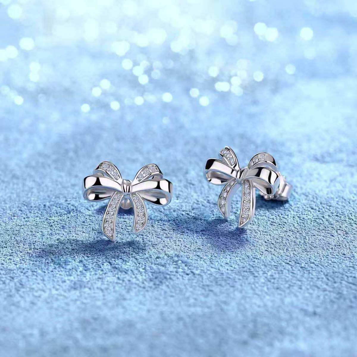 SE0764806款S925银镀18K金莫桑钻蝴蝶结耳钉0.16ct